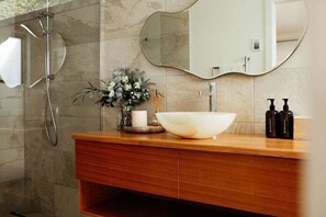 Hair dryer, towels, soap, shampoo