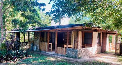 Serene 1-bedroom cottage in organic garden near Xaibe perfect for relaxing stays