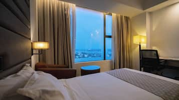 Business Twin Room, River View | Premium bedding, down comforters, memory foam beds, minibar