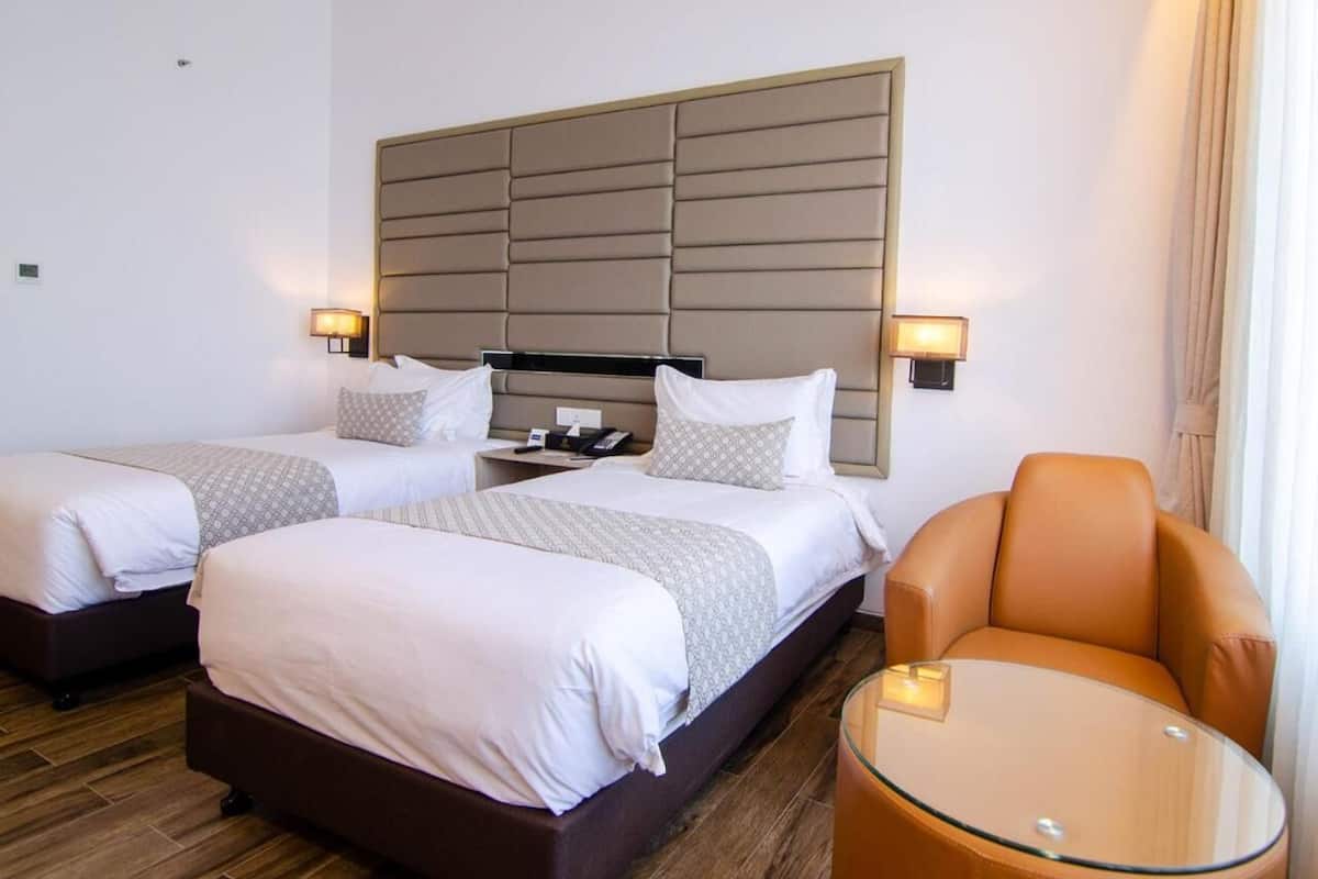 Premium bedding, down comforters, memory foam beds, minibar
