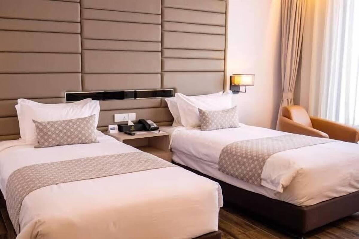 Business Twin Room, River View | Premium bedding, down comforters, memory foam beds, minibar