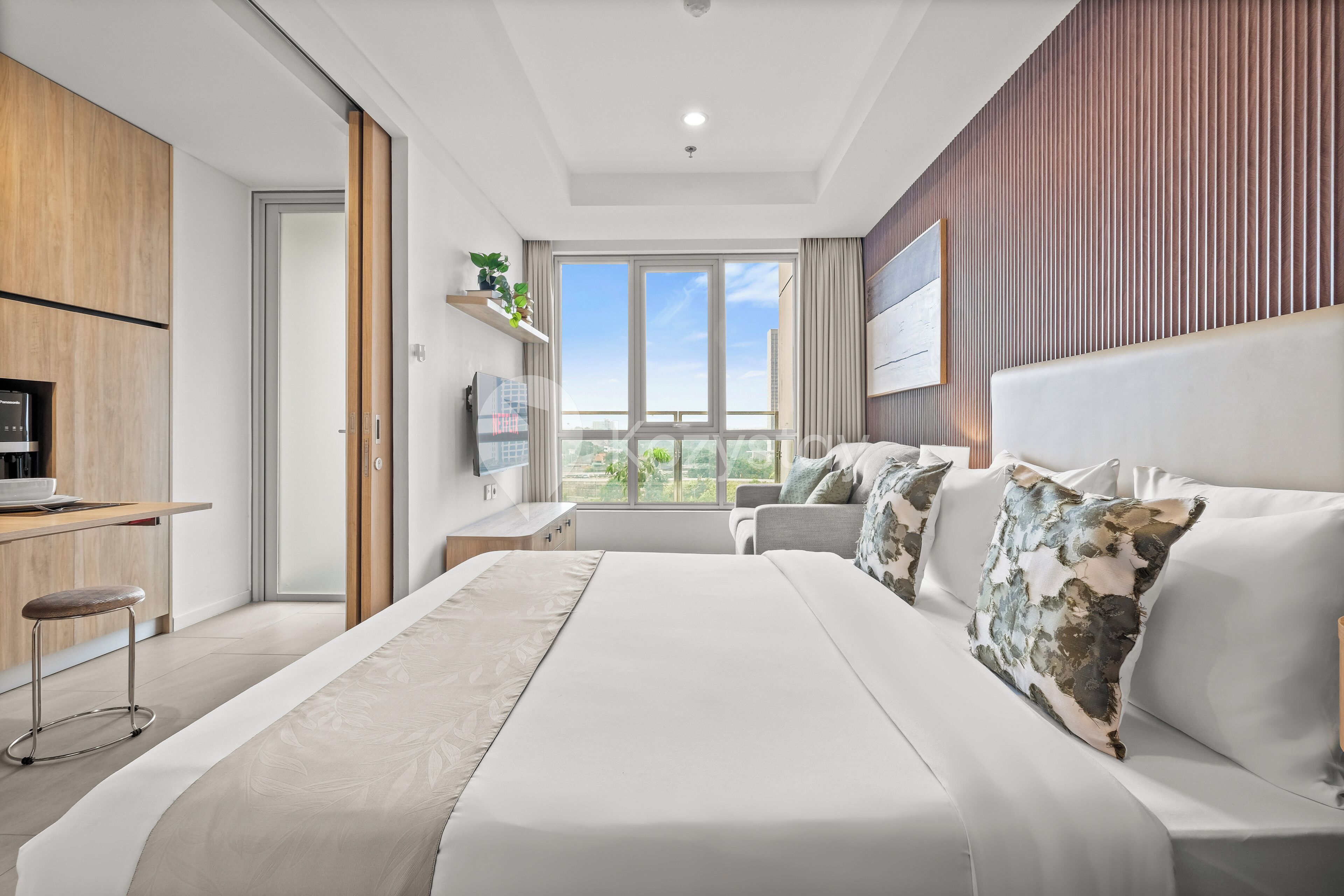 Apartment, 1 Bedroom, City View | Desk, laptop workspace, iron/ironing board, free WiFi