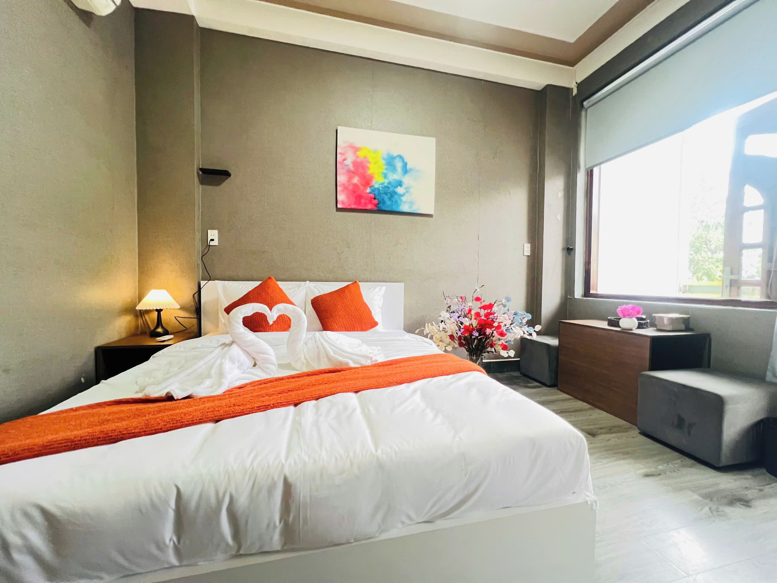 Deluxe Double Room, Balcony | In-room safe, desk, laptop workspace, blackout drapes