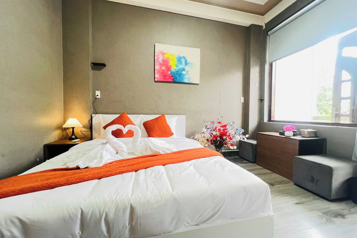 Deluxe Double Room, Balcony | In-room safe, desk, laptop workspace, blackout drapes