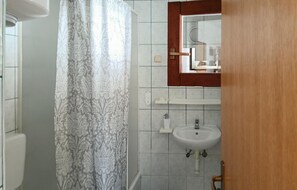 Douche, sèche-cheveux