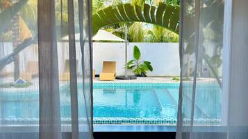 Suite Deluxe, vista a la alberca | Vista desde la habitación