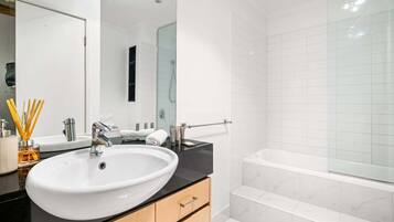 Shower, hair dryer, towels