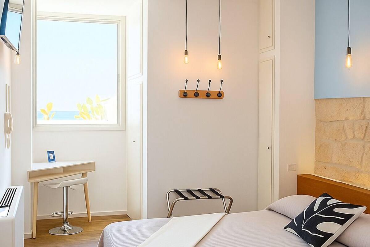 Deluxe Double Room, Sea View | Blackout curtains, iron/ironing board