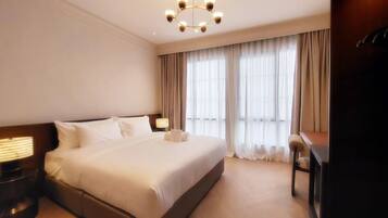 Chambre Deluxe | Coffres-forts dans les chambres, bureau, Wi-Fi gratuit, draps fournis