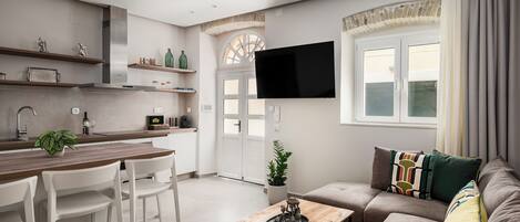 Superior Apartment, 1 Queen Bed with Sofa bed | Living area | 32-inch Smart TV with digital channels