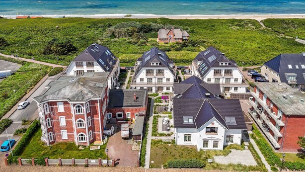 A residential area with houses near a beach. - Dünenloft, House Kliff Whg. 11 - Dünenlofts (Sylt)