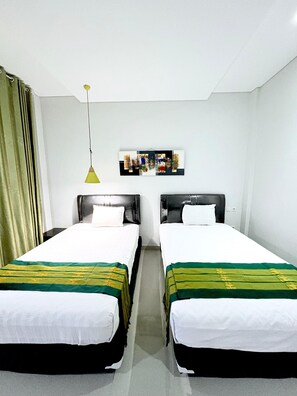 Deluxe Double Room, Ocean View | Desk, laptop workspace, free WiFi