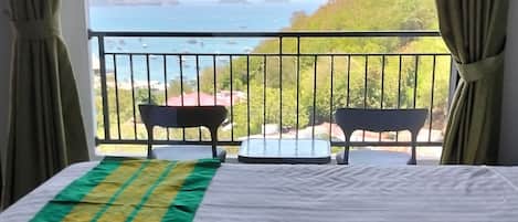 Deluxe Double Room, Ocean View | Desk, laptop workspace, free WiFi