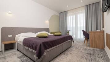 Deluxe Double or Twin Room, Balcony, Sea View | In-room safe, desk, laptop workspace, soundproofing