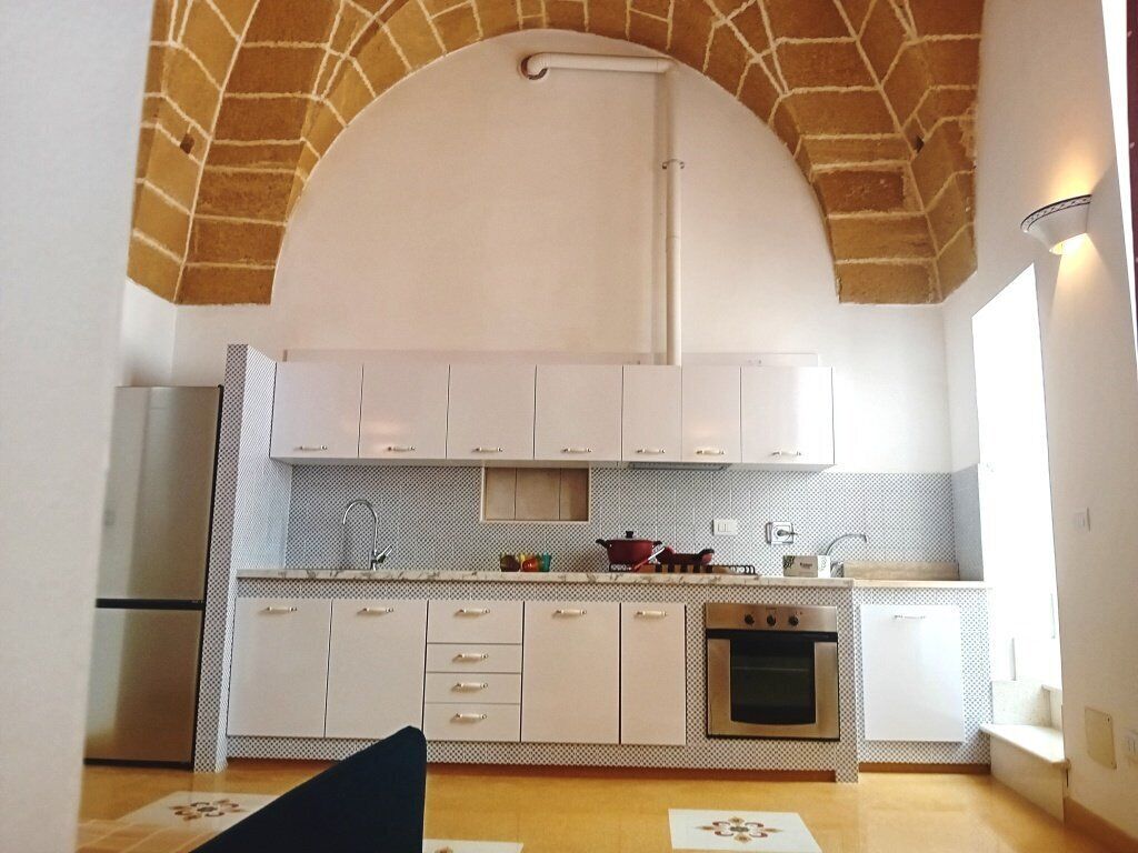 Apartamento conforto, vista para o mar | Cozinha privada | Refrigerador em uma área comum