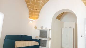 Apartamento conforto, vista para o mar | Área de estar