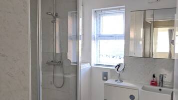 Hair dryer, towels, soap, toilet paper