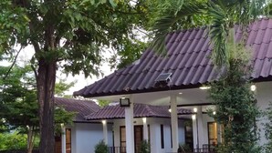 A building with a tiled roof and multiple rooms. - A-Thip House (Pai)