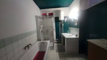 Bidet, towels, soap, toilet paper