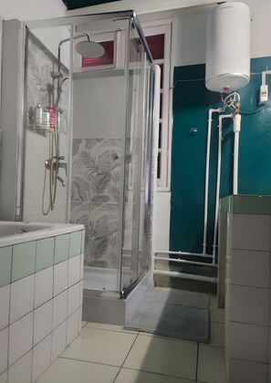 Bidet, towels, soap, toilet paper