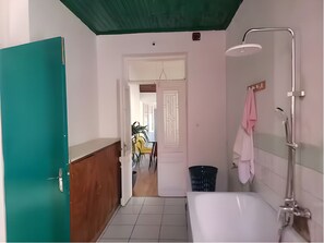 Bidet, towels, soap, toilet paper