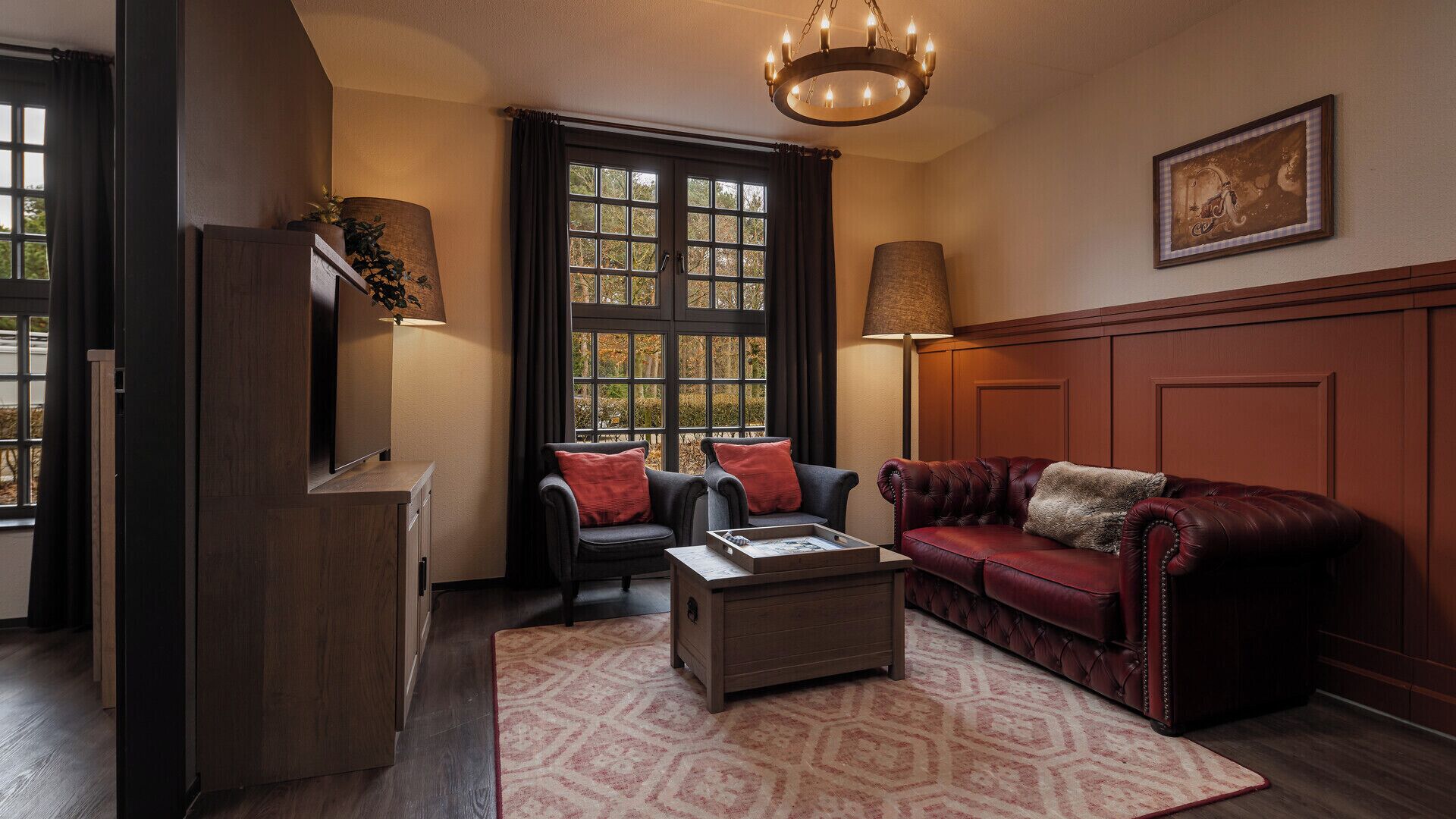 Premium Room Landhuys (with unlimited amusement park access) | Living area | 32-inch LED TV with cable channels