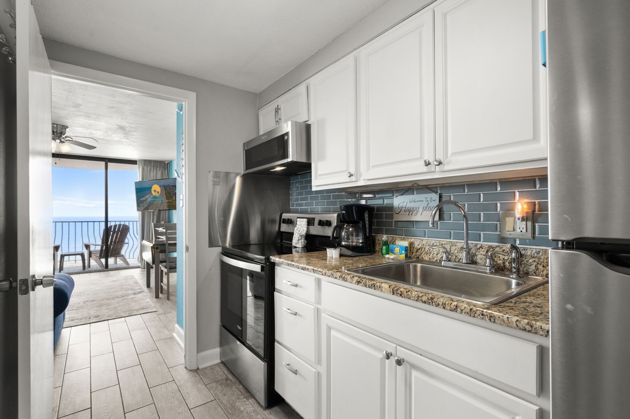 Fridge, microwave, stovetop, coffee/tea maker