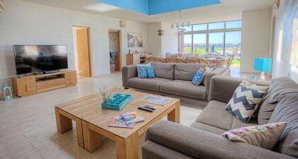 Stunning villa with awesome pool and direct golf and ocean views!