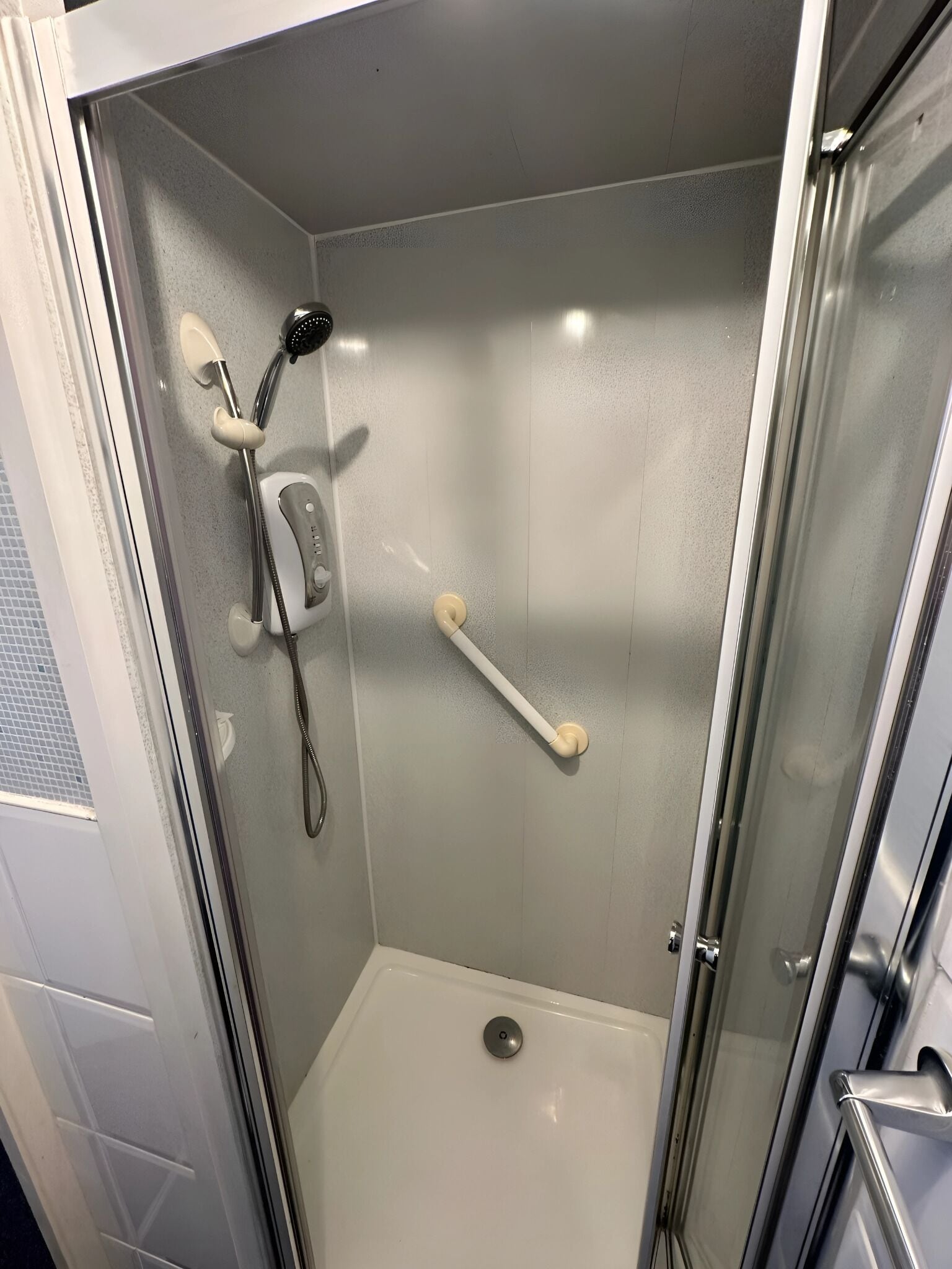 Shower, towels, soap, shampoo