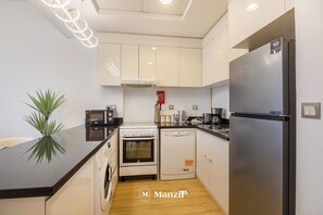 Luxury Apartment, Balcony, City View | Private kitchenette