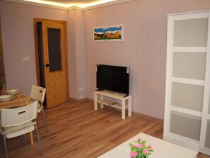 Monolocale Basic | Area soggiorno | TV