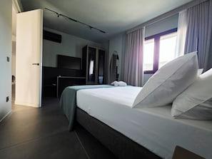 Suite Deluxe, vistes al jardí | Roba de llit d'alta qualitat i cobrellits