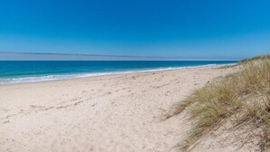 A beach with clear skies and calm waters. - "Serenity & Sea", Pool, Wi-Fi, Internet, Netfilix/Stan, 500m to Beach, Parking (Preston Beach)