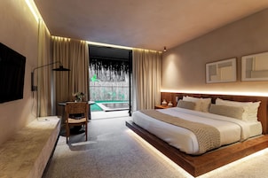 Deluxe Bungalow, Garden View | In-room safe, desk, laptop workspace, blackout drapes