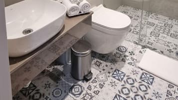 Luxury Room, 2 Twin Beds | Bathroom | Shower, hair dryer, slippers, towels