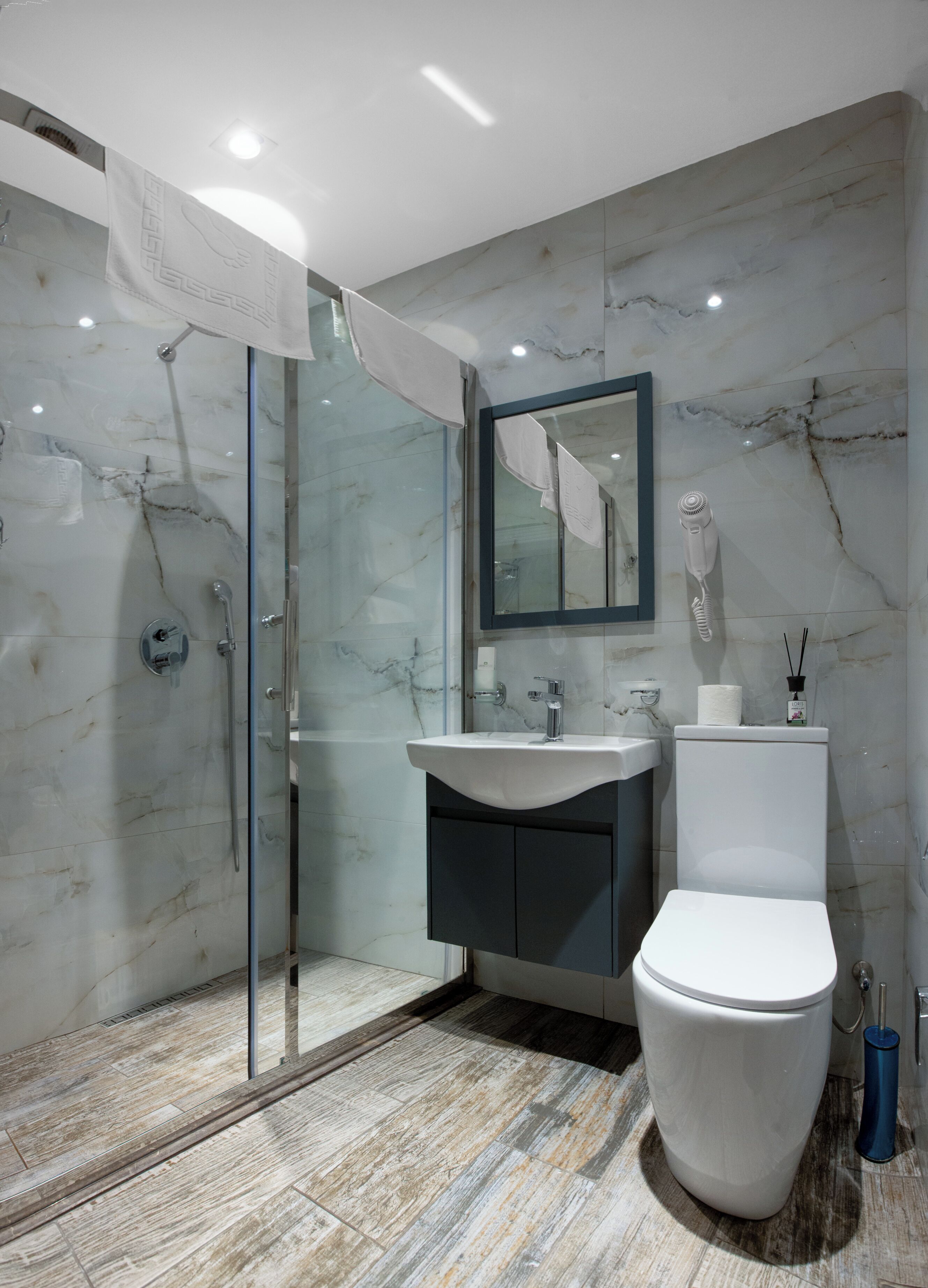 Shower, hydromassage showerhead, designer toiletries, hair dryer