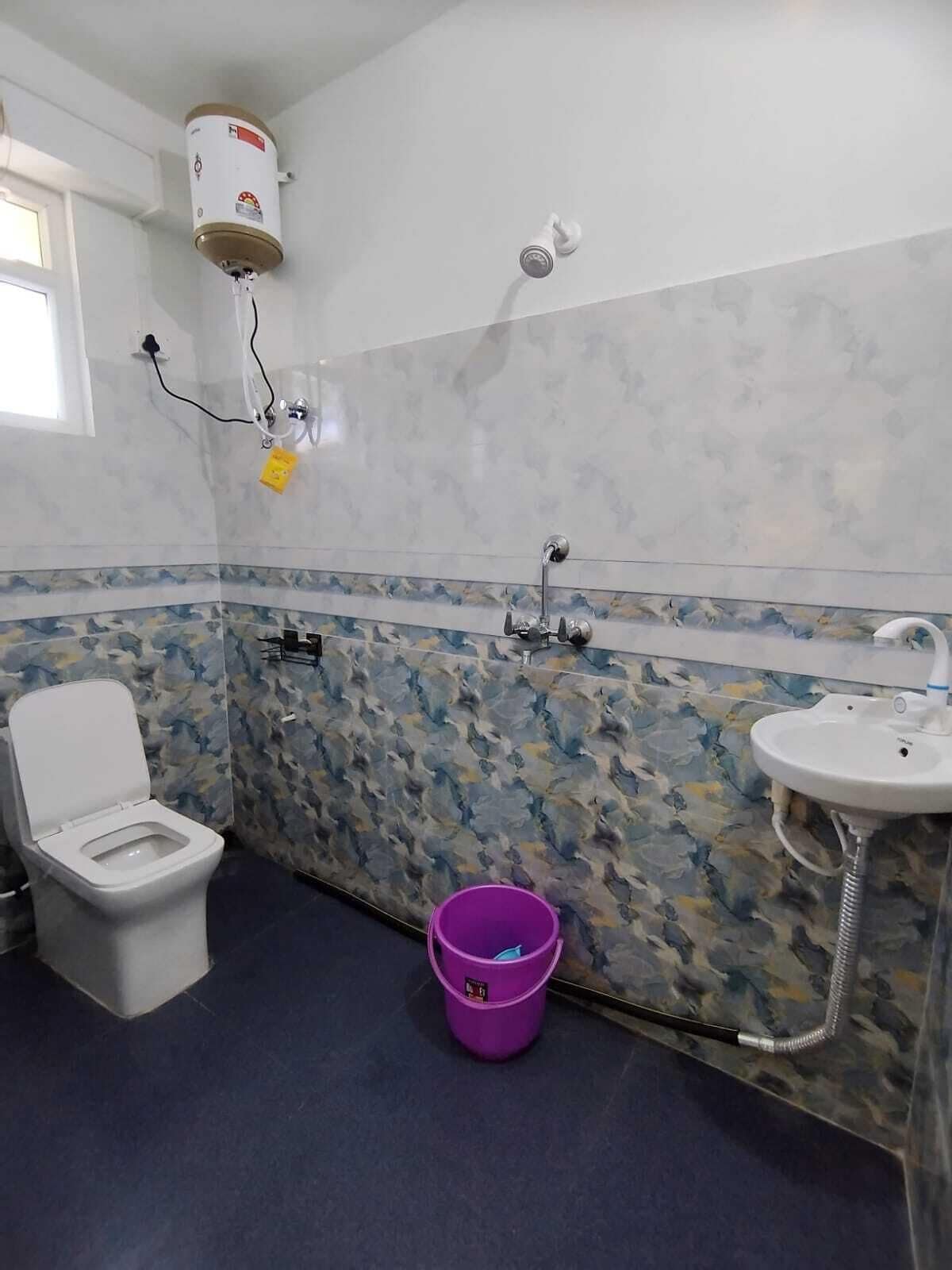 Deluxe Double Room, City View | Bathroom | Shower, towels, soap, toilet paper