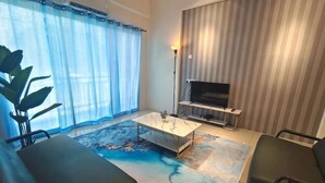 A modern living room with a sofa, coffee table, TV, and curtains. - Pavilionvillie M1T584 by Irainbow (Kinta)
