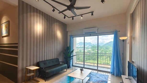 A modern living room with a sofa, coffee table, and TV, large windows with a view of mountains, and a ceiling fan. - Pavilionvillie M1T584 by Irainbow (Kinta)