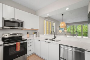 Fridge, microwave, oven, stovetop - Completely Updated 2BR Condo–Cedars East #613 by RVA (Longboat Key)