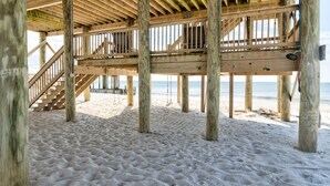 A wooden beach deck with railings and stairs leading to a higher level. - Sea La Vie - 106 Velasco Ct 4 Bedroom Home (Dauphin Island)