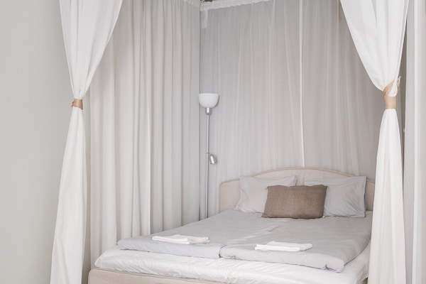 Standard Apartment, Courtyard View | Blackout drapes, free WiFi, bed sheets