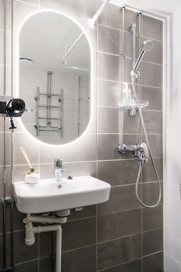 Standard Apartment, Courtyard View | Bathroom - 1BR Demure Design & Urban Living in Kamppi (Helsinki)