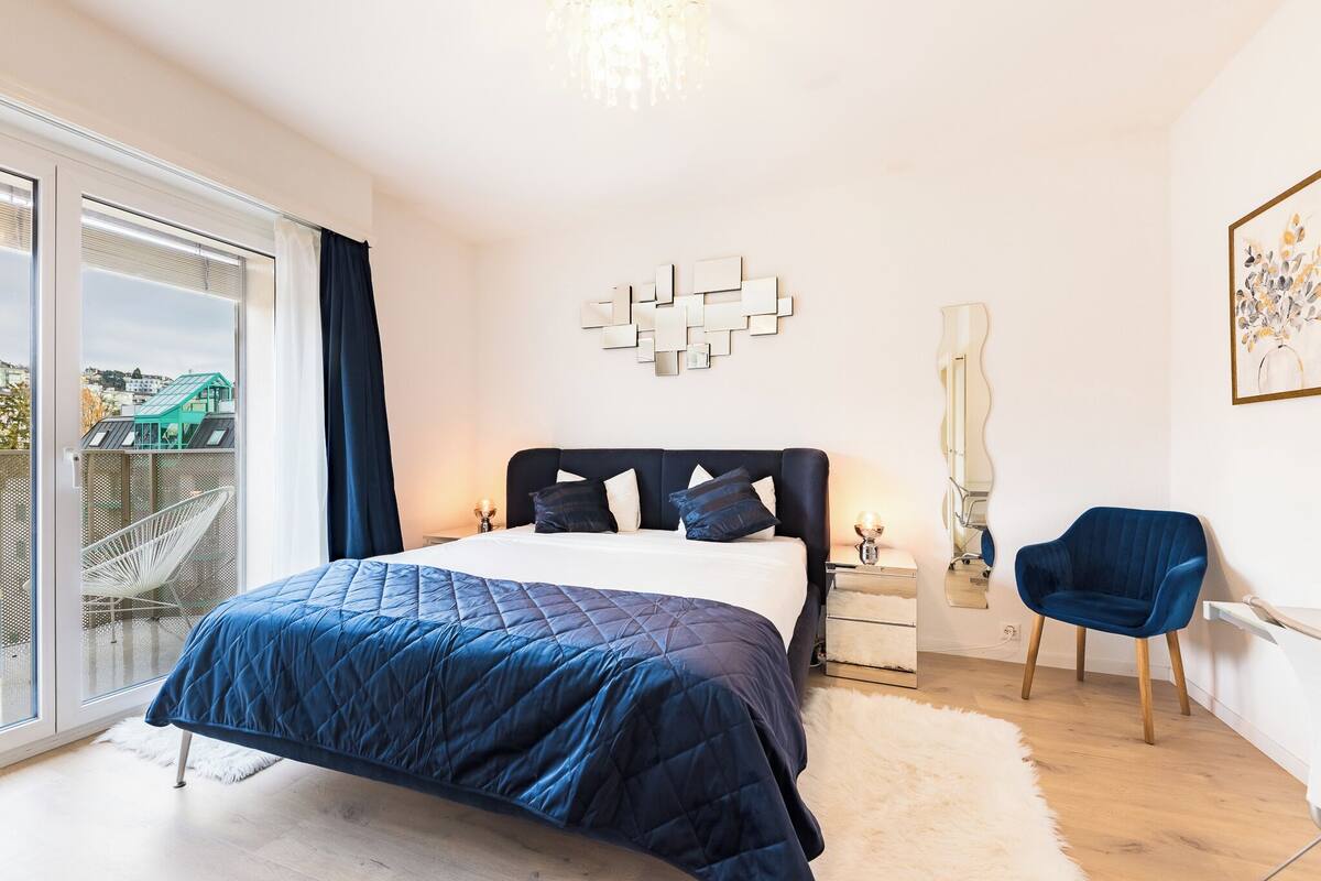 Departamento, balcón, vista a la ciudad | Tabla de planchar con plancha