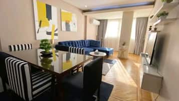 Apartment, 2 Bedrooms, Lake View | Living area | 55-inch Smart TV with digital channels