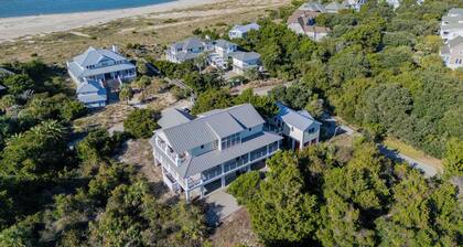 7-bedroom water view compound featuring a main house and annex. The Main House,