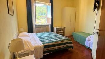 Habitación triple básica | Ropa de cama