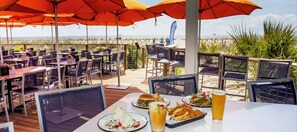 Outdoor dining - Beachside Colony Tybee’s Only Oceanfront Resort•New Listing Pool&Ocean Views 2/2 (Tybee Island)