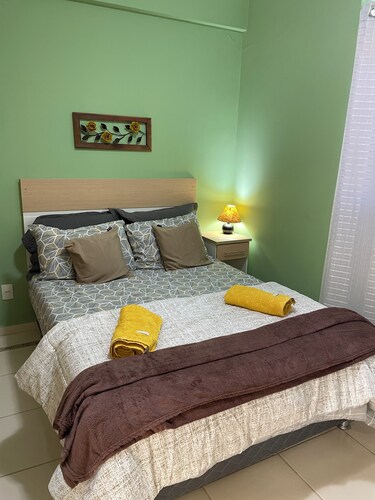 Green apartment in the center of Caxambu.