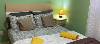 Green apartment in the center of Caxambu.